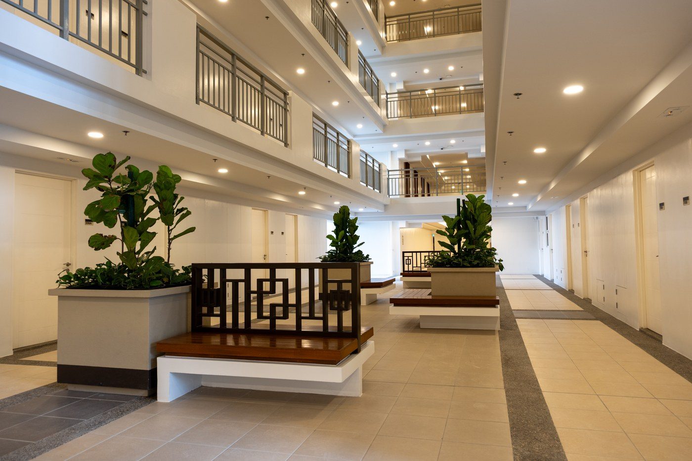 Naturally lit atrium corridor inside The Oriana