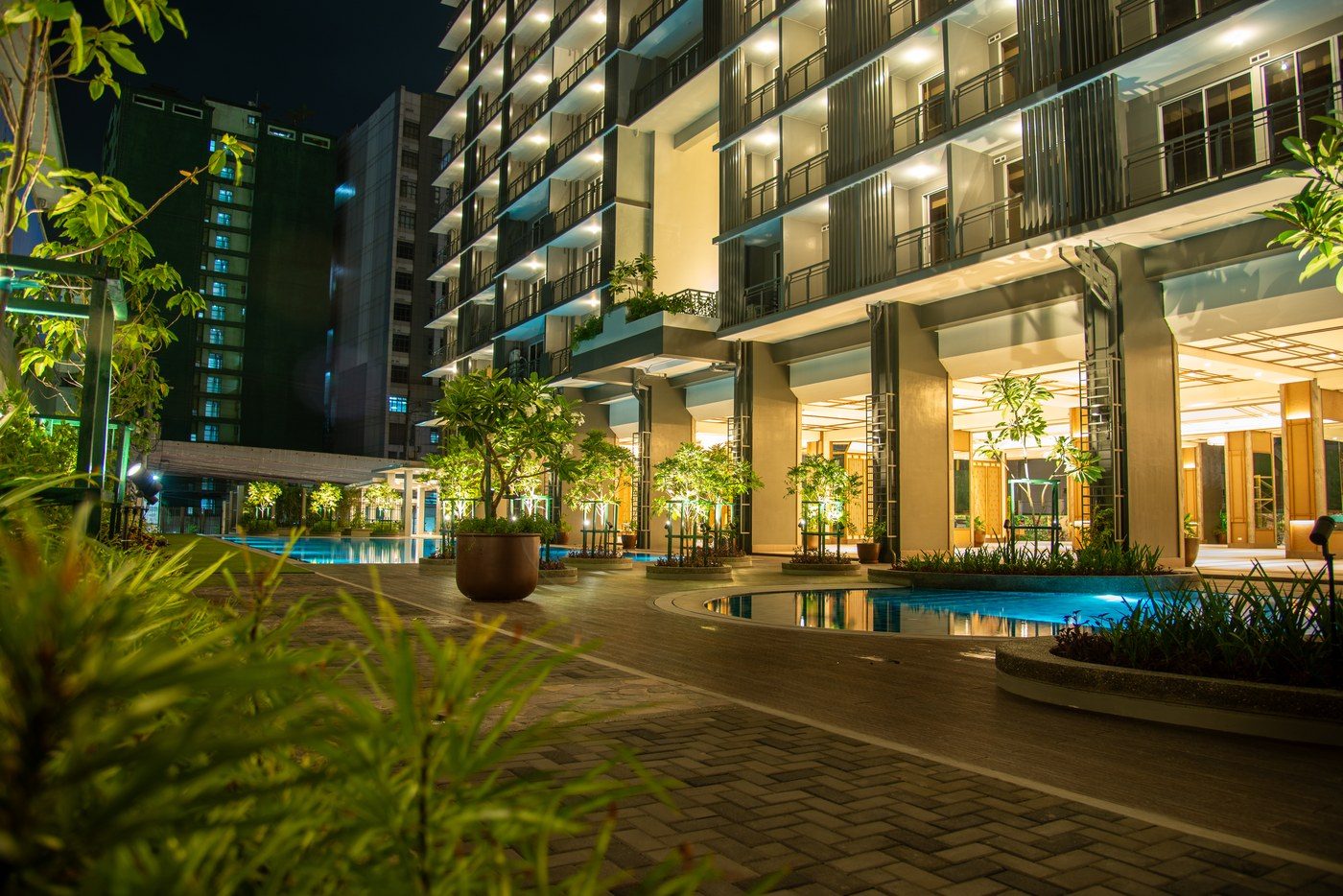 Ground floor garden and pool amenities at The Oriana