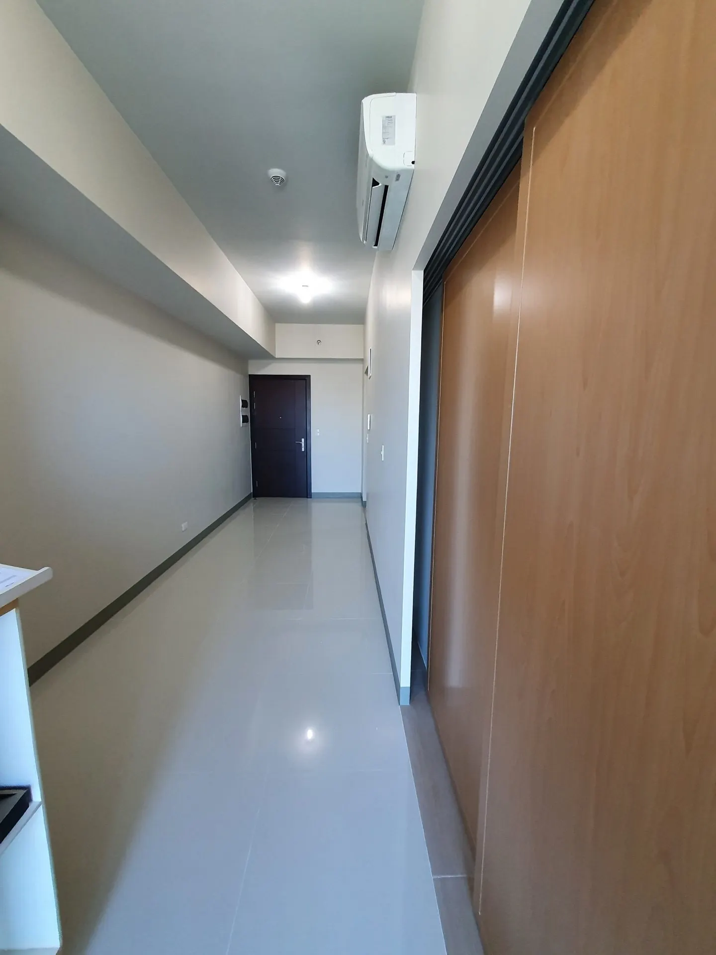 Uptown Parksuites Tower 2 Type U unit — bare condition, main living area